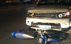 “Siêu xe” biển Thủ đô kéo lê xe máy 20m, 2 người nhập viện