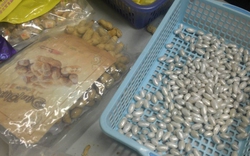 Giấu gần 3kg heroin trong... kẹo, lạc sấy khô