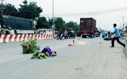 Né xe tải bên đường, một phụ nữ bị container cán tử vong