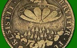Đồng xu cổ xưa in hình "người ngoài hành tinh"