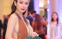 Angela Phương Trinh hết ôm chó lại đến múa quạt trên thảm đỏ