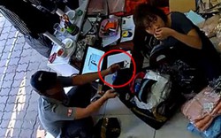 Clip: Người đàn ông "cuỗm" iPhone ngay trước mặt nữ nhân viên