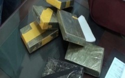 Bắt quả tang đối tượng mua bán, vận chuyển 7 bánh heroin