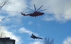 Chỉ có ở Nga: Trực thăng "dắt" tiêm kích đi dạo