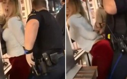 Cô gái xinh đẹp có hành động lố bịch gây "đỏ mặt" với nam cảnh sát khi bị bắt