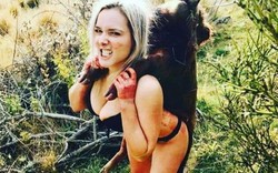 Cô gái gây phẫn nộ vì tung ảnh khoe thân với xác thú rừng
