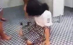 Nữ sinh lớp 7 bị đánh hội đồng trong nhà vệ sinh