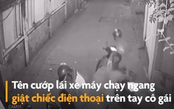 VIDEO: Cô gái cầm điện thoại đứng trong hẻm bị tên cướp phóng xe máy giật phăng