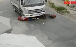 Video: Ngã vào gầm xe tải, cô gái may mắn thoát chết trong gang tấc