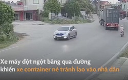 Video: Hãi hùng xe container lao vào nhà dân khi tránh xe máy băng qua đường