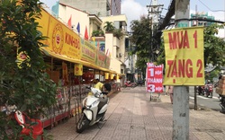Thực hư bánh trung thu "mua 1 tặng 3", "mua 1 tặng 4" đầy đường phố Sài Gòn