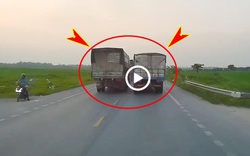 Clip: Xe tải chèn ép nhau giành đường bất chấp đi trái chiều