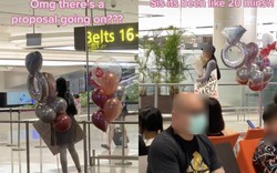 Cô gái ôm biển cầu hôn "gây sốt" ở sân bay Changi