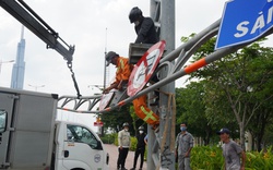 Vụ ô tô tải tông gãy thanh sắt giới hạn chiều cao dưới chân cầu Sài Gòn: Xe tải bị xe máy tạt đầu?
