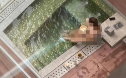 Sốc với cặp đôi vô tư "diễn cảnh nóng" trong bồn nước ngoài trời 