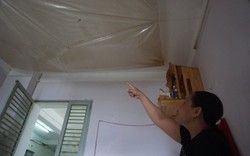 Dùng túi nilon hứng nước mưa trong nhà tại chung cư xuống cấp ở Đà Nẵng