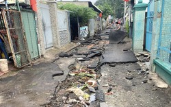 Đồng Nai mưa lớn gây ngập nặng, sập tường, hỏng đường: Người dân khổ sở dọn dẹp tàn dư