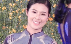 Hoa hậu Ngọc Hân khoe sắc với áo dài trên cầu Trường Tiền xứ Huế