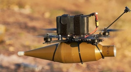 Ảnh thế giới 7 ngày qua: Binh lính Ukraine thử nghiệm UAV tự sát và cơn bão Helene tàn phá nước Mỹ