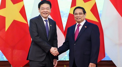 Hình ảnh Thủ tướng Phạm Minh Chính chủ trì lễ đón Thủ tướng Singapore tại Hà Nội