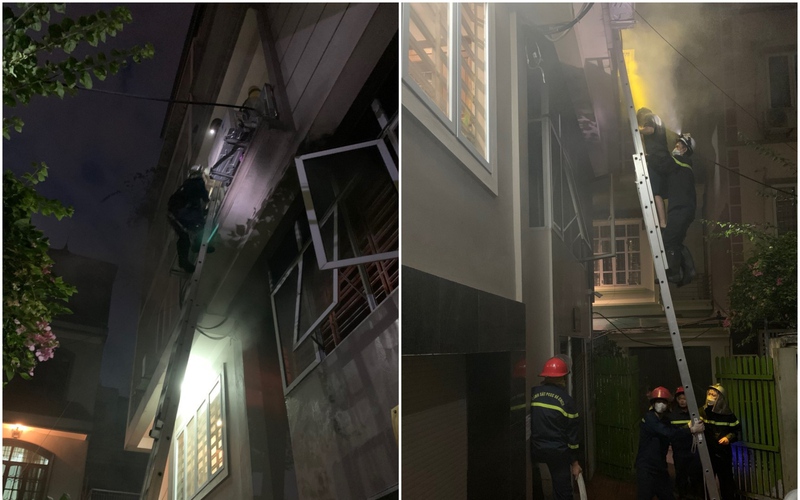 Cảnh sát dùng thang chuyên dụng giải cứu 4 người mắc kẹt trên tầng 3 trong đám cháy ở Hà Nội